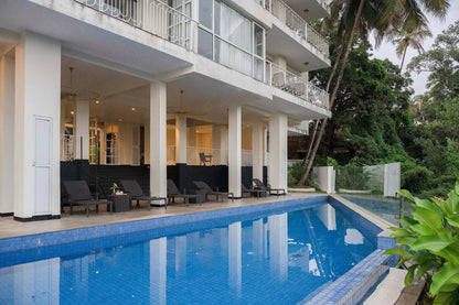 Juno - 2 BHK Luxury Suite with Pool facing lush greens in Candolim, Goa