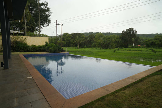Staycationer Jashn, Parra - 3 BHK Villa with Large Garden View Pool