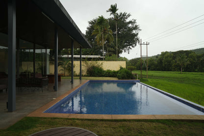Staycationer Jashn, Parra - 3 BHK Villa with Large Garden View Pool