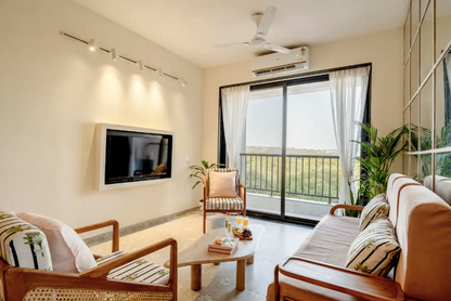 The Den - Chic and breezy 2-bedroom with a view in Candolim, Goa with Pool!