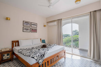 Juno - 2 BHK Luxury Suite with Pool facing lush greens in Candolim, Goa